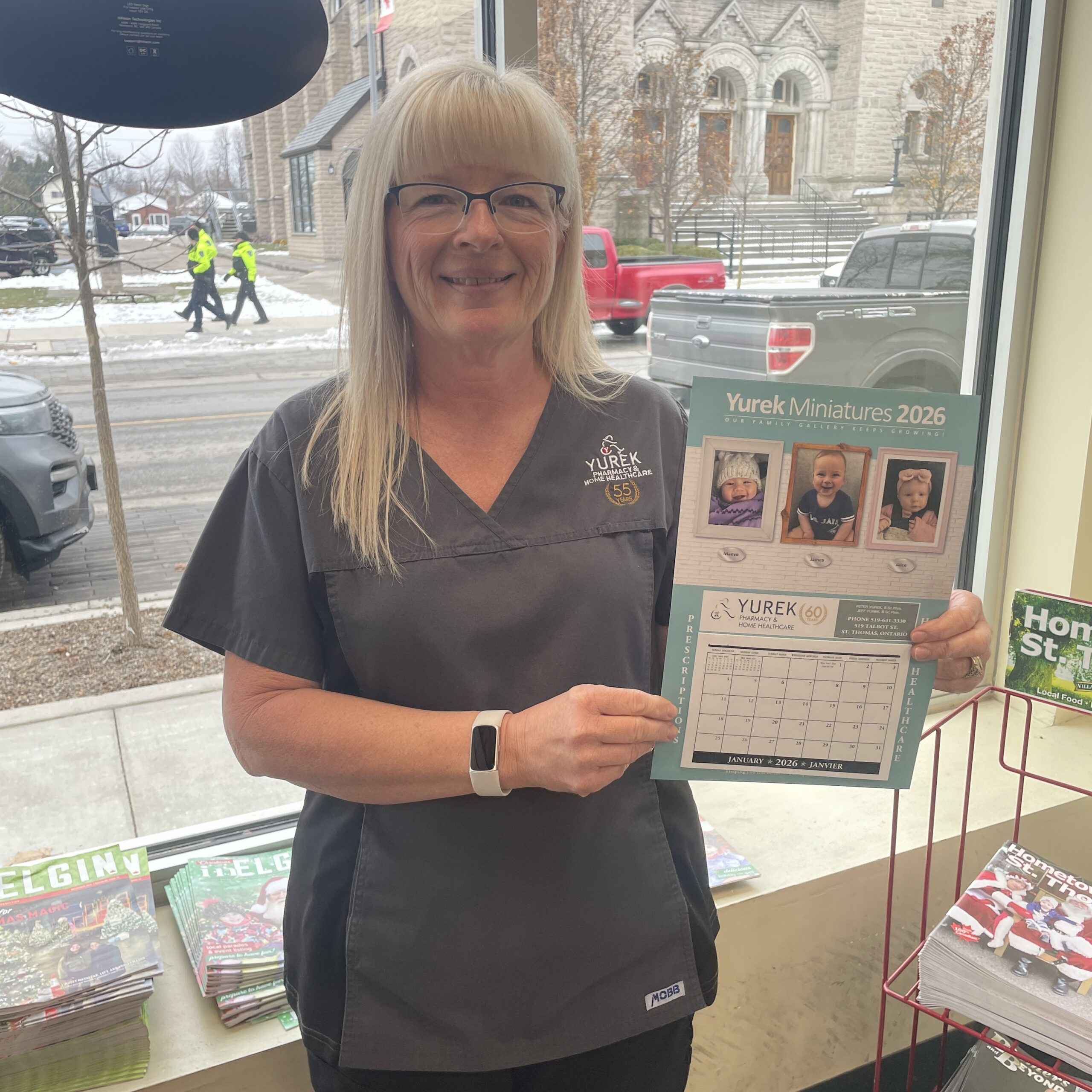Becky holding Yurek Calendar