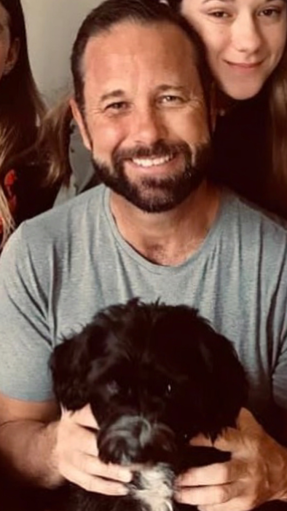 Steve Bond with his puppy.